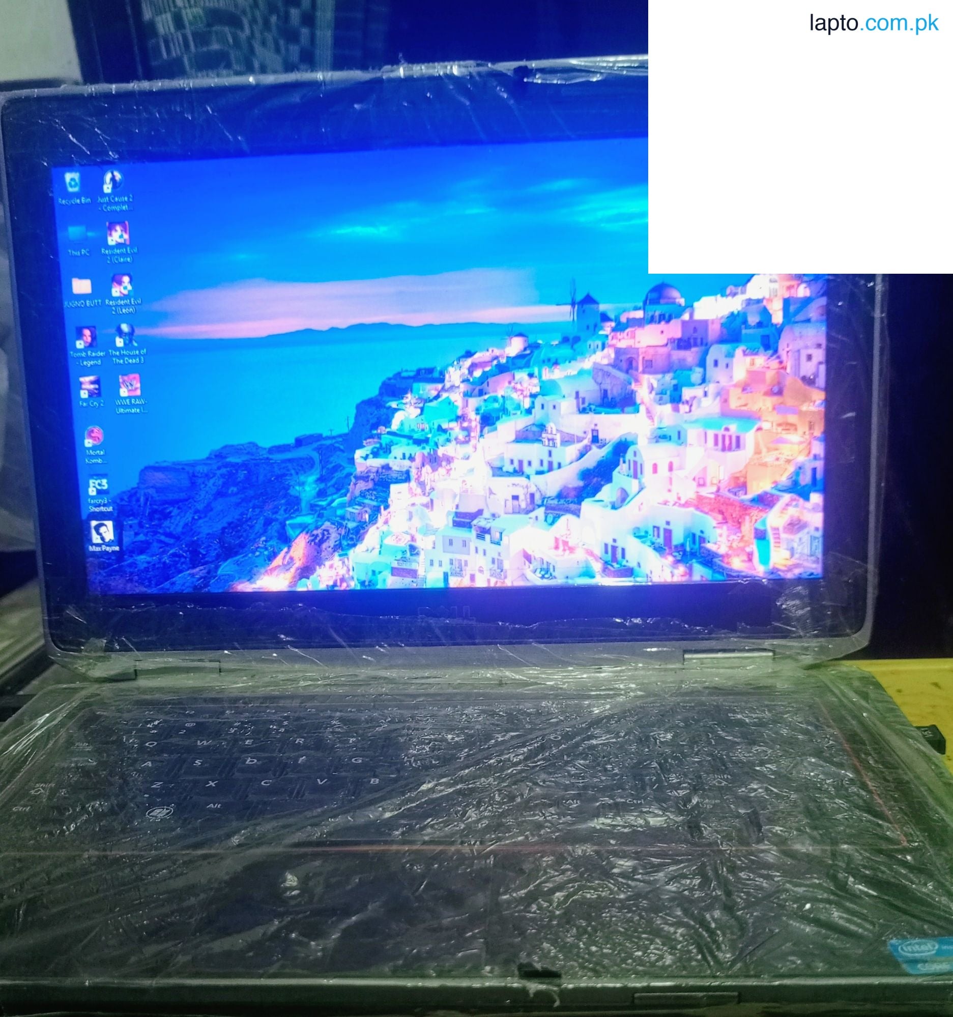 dell llatitude with charger i5 2nd gen 4/230 8-10 condition