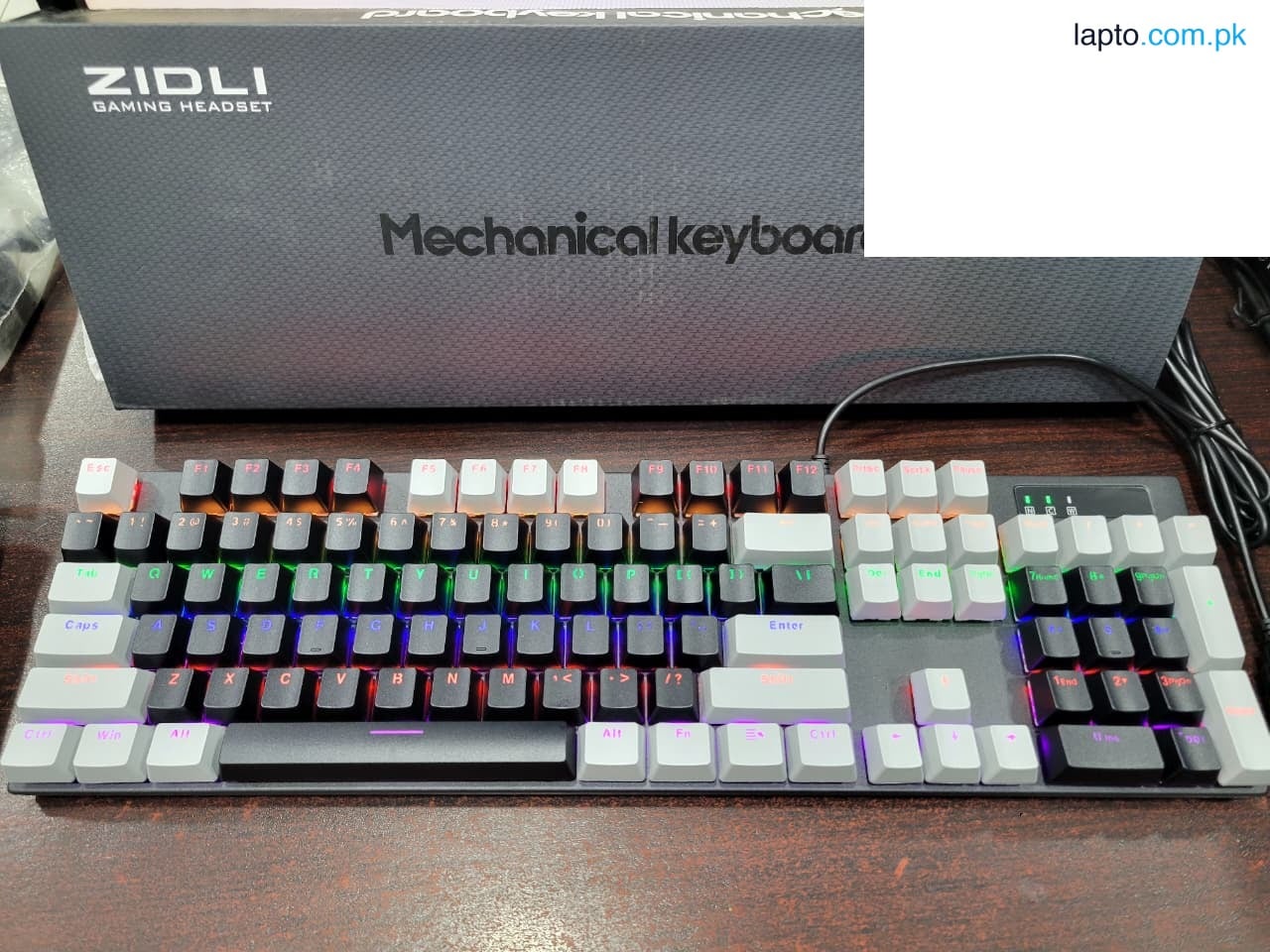 Zidli ZK100 Blue Switches Mechanical Gaming Keyboard, 104 Keys, RGB Rainbow Lights, 12 Modes Lightening effects.